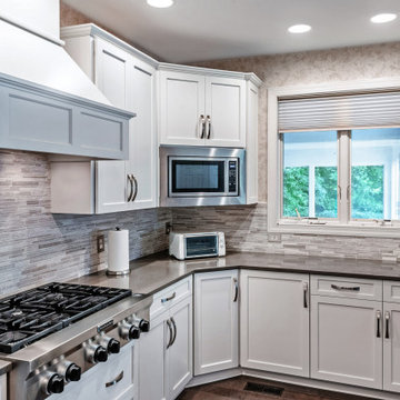 Contrasting White and Dark Gray Cabinets and Countertops in Crownsville, MD
