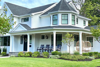 Example of a country exterior home design in New York