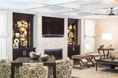 Inspiration for a large transitional open concept dark wood floor and brown floor living room remodel in New York with gray walls, a ribbon fireplace, a stone fireplace and a wall-mounted tv