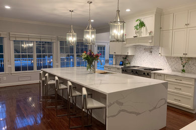 Kitchen - kitchen idea in Philadelphia with quartz countertops and white countertops