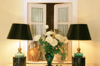 Small mediterranean hallway in London with beige walls.