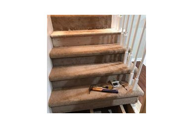 Staircase - mid-sized craftsman wooden u-shaped wood railing staircase idea in Other with wooden risers