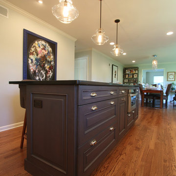 Warm Gray Stained Island with Sueded Granite Countertop