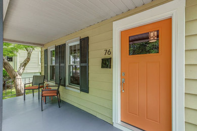 Transitional front porch photo in New York