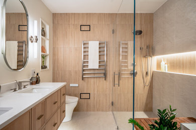 Bathroom - large contemporary master beige tile and porcelain tile ceramic tile, beige floor, double-sink, vaulted ceiling and brick wall bathroom idea in DC Metro with flat-panel cabinets, beige cabinets, a one-piece toilet, beige walls, an undermount sink, quartzite countertops, white countertops and a floating vanity