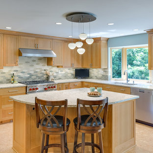 Inspiration for a mid-sized modern l-shaped kitchen pantry in Portland with an undermount sink, recessed-panel cabinets, light wood cabinets, multi-coloured splashback, subway tile splashback, stainless steel appliances, cork floors and with island.