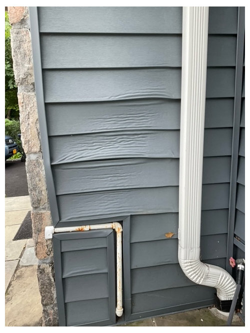 Ideas on replacing damaged vinyl siding with different material.