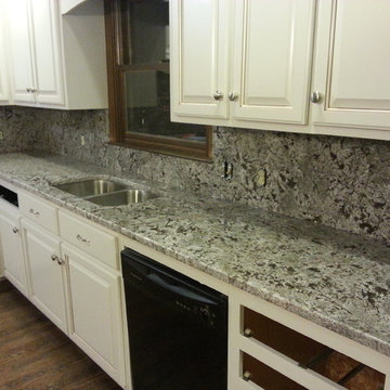 Bianco Antico Counter-top and full height granite back splash