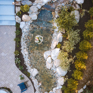 Back Yard Landscape Transformation with Incredible Water Feature