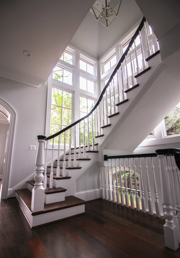 Powerful Impression by Floating Staircase in Suburban Foyer
