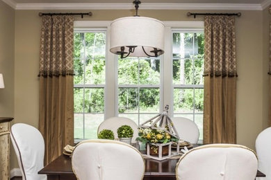 Inspiration for a mid-sized timeless dark wood floor and brown floor dining room remodel with brown walls