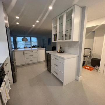 Transitional Kitchen Remodel Done in a Satin White Slim Shaker Door