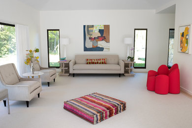 Example of a transitional living room design in New York