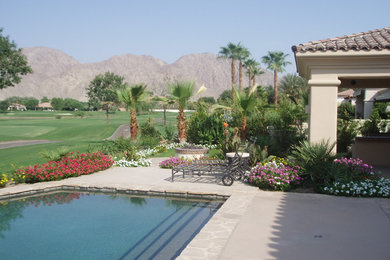 Example of a southwest home design design in Other