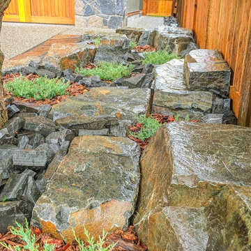 Maintenance-Free Front Yard Featuring Custom Stonework