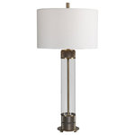 Uttermost - Uttermost Anmer Industrial Table Lamp 28414-1 - Showcasing A Clean Transitional Look, This Table Lamp Features A Clear Glass Base Accented With Antiqued Brass Plated, Heavy Textured Iron Details For A Soft Industrial Feel. The Lamp Is Paired With A White Fabric Drum Shade.