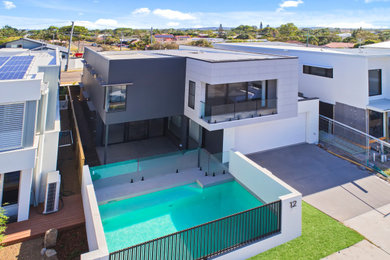 Photo of a contemporary exterior in Sunshine Coast.