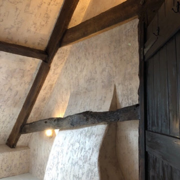 A distressed and beautiful shower in an attic