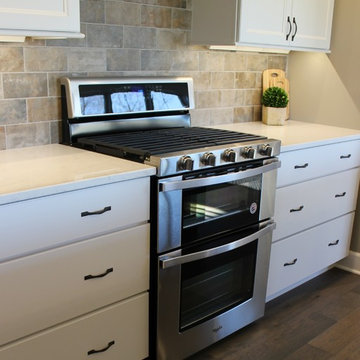 Blue Kitchen Island in Edgebrooke Homes Bettendorf, Iowa Kitchen