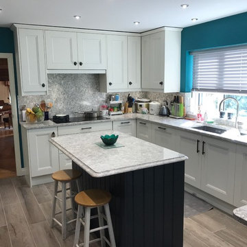 Painted beaded kitchen with central prep island