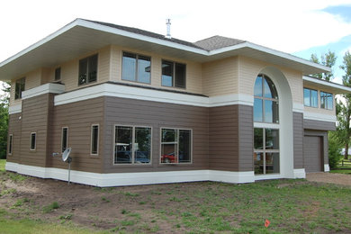 Example of a minimalist exterior home design in Other