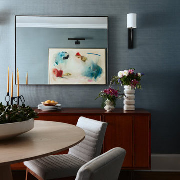 Dining Room with Fine Art, Blue Grasscloth, and Console