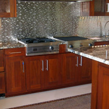 White Kitchen With Black Island Multi Colored Bamboo Flooring