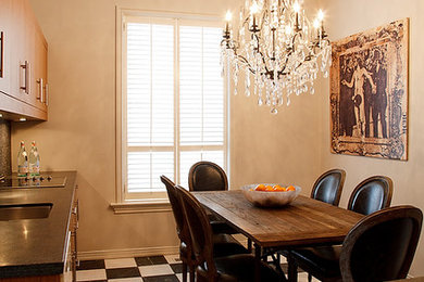 Example of a mid-sized transitional porcelain tile kitchen/dining room combo design in Toronto with beige walls and no fireplace