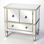 Butler Specialty Company - Butler Celeste Mirrored Console Cabinet - This dramatic console cabinet features elegant antique mirror inlays on its top, drawer fronts, sides and tapered feet. No detail is overlooked with a beveled edged top and beaded carving on its base, all accentuated by pewter finished trim. Handcrafted from select hardwood solids and wood products with antique brass finished hardware, it boasts a convenient storage area with an adjustable shelf and a spacious bottom drawer.