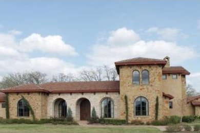 Inspiration for a mediterranean exterior home remodel in Austin