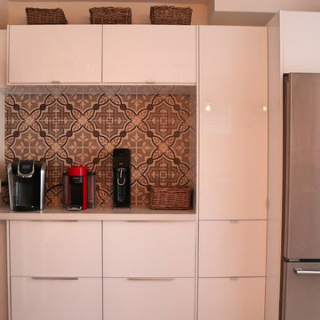 Single wall 18' IKEA kitchen with 6' island. RINGHULT high-gloss IKEA finish.