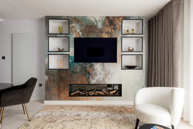 Design ideas for a medium sized contemporary open plan living room feature wall in Kent with carpet, a built-in media unit, beige floors, grey walls and wallpapered walls.