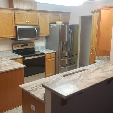 Fantasy Brown Dolomite + Medium Brown Cabinetry