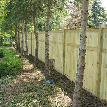 Decorative treated privacy fence