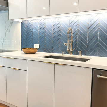 A minimalist kitchen with touch of gold