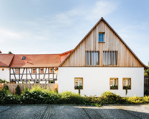 Landhausstil Häuser mit Holzfassade Ideen, Design & Bilder | Houzz