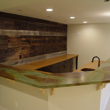 Basement bar with acid stain concrete countertops