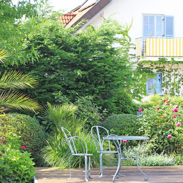 Garten mit Urlaubsflair und Koiteich