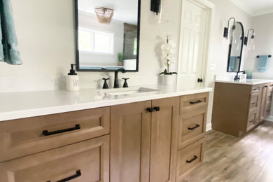 Example of a large transitional master blue tile and ceramic tile porcelain tile, beige floor and double-sink bathroom design in Chicago with flat-panel cabinets, beige cabinets, a two-piece toilet, beige walls, an undermount sink, quartz countertops, a hinged shower door, white countertops, a niche and a freestanding vanity