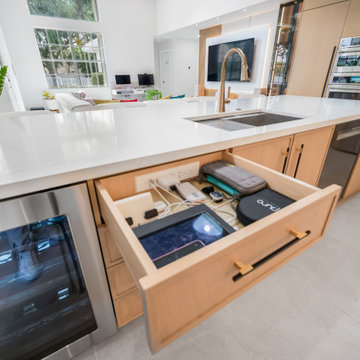 In-Drawer Outlet + Organization in Custom Island Cabinetry