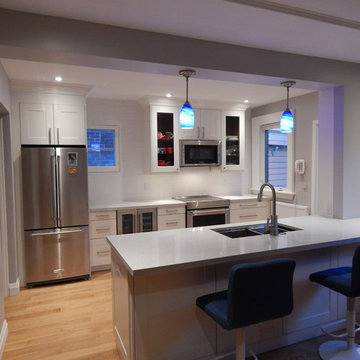 Open-Concept IKEA Kitchen - Grimslov White with Blue Accents and Gumwood Trim