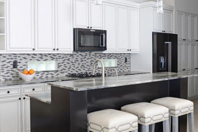 Example of a transitional kitchen design in Miami