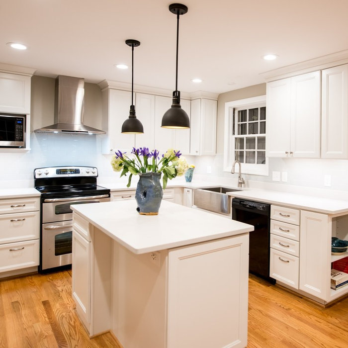 This remodeled kitchen was opened up to a previous formal dining room for a pleasant gathering space.