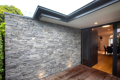 Inspiration for a contemporary front door in Christchurch with a single front door.