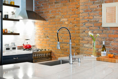 Inspiration for an industrial kitchen remodel in New York