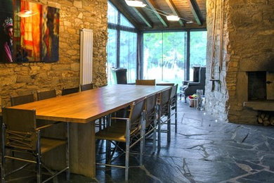 This is an example of a large contemporary open plan dining in Other.