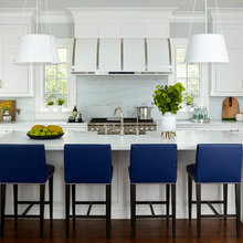 judy kitchen - white with dark floors and white countertops - island st