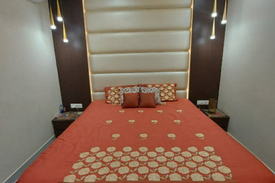 Design ideas for a contemporary bedroom in Kolkata.