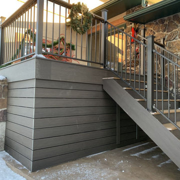 Under-deck skirting for storage and animal control