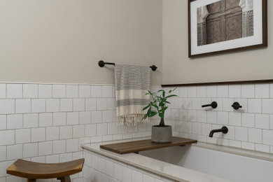 Example of a mid-sized beach style master white tile and ceramic tile terra-cotta tile, gray floor, single-sink and wainscoting bathroom design in San Diego with shaker cabinets, dark wood cabinets, a one-piece toilet, beige walls, an undermount sink, quartz countertops, a hinged shower door, white countertops and a freestanding vanity
